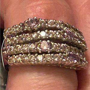 Beautiful sterling silver ring with pink n purple stones not sure if it’s real💎